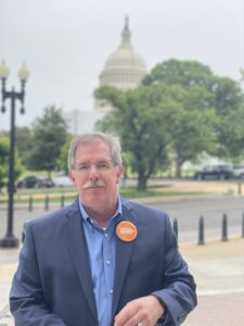 George Manahan in front of White House